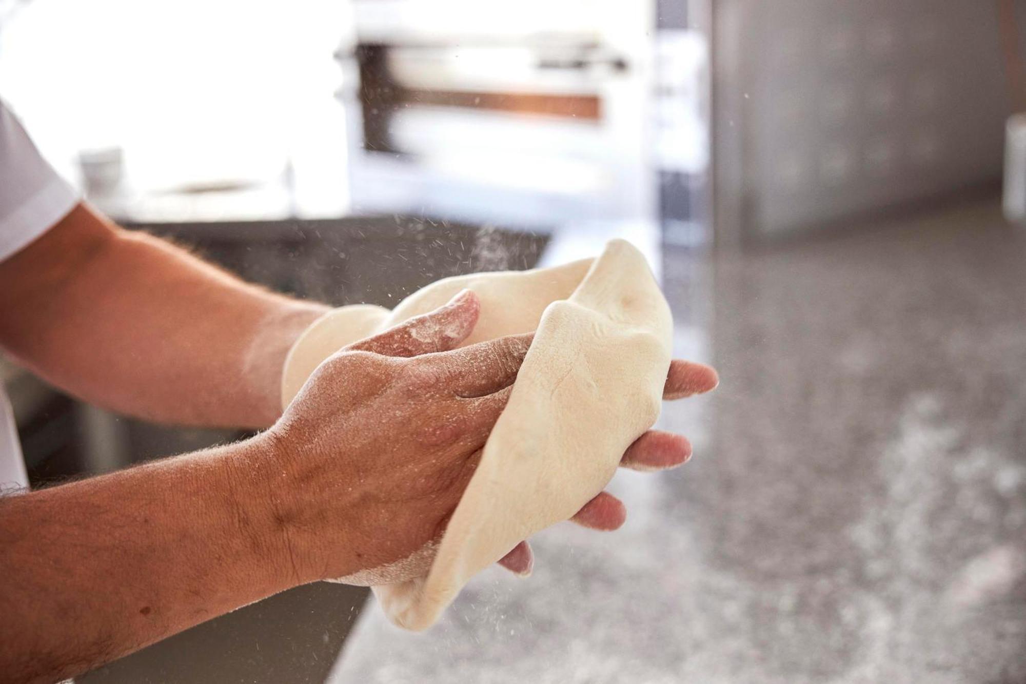 Monchique Resort & Spa Екстериор снимка A baker kneading bread dough